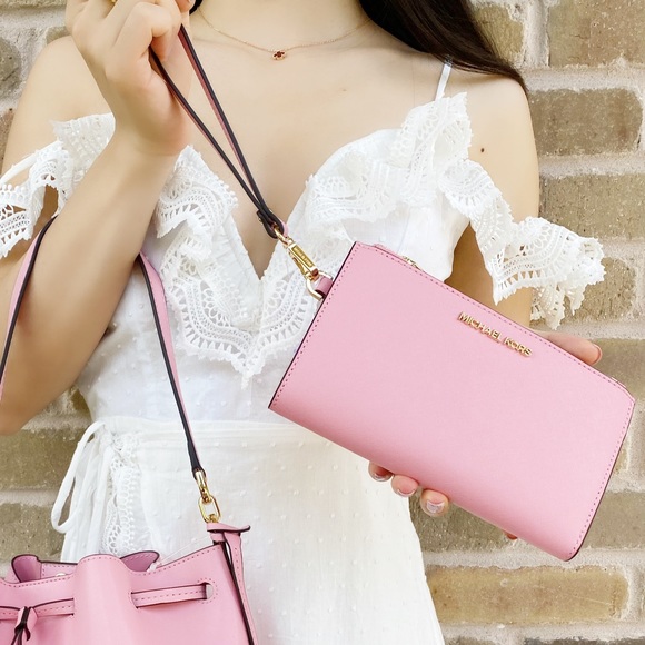 Michael Kors Handbags - Michael Kors Large wristlet wallet bubblegum Pink